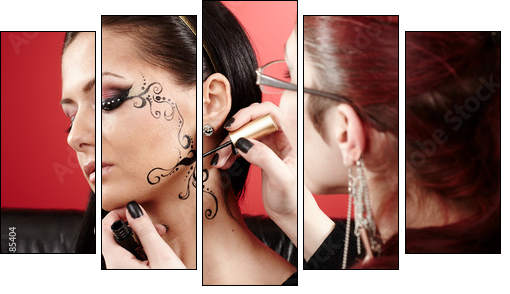 Brunette having applied face tattoo by makeup artist - Five-piece canvas, Pentaptych
